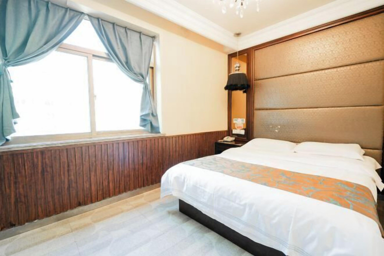 Bedroom 3, HomeInn Pebble Motel (Qingdao May 4th Square Olympic Sailing Center store), Qingdao