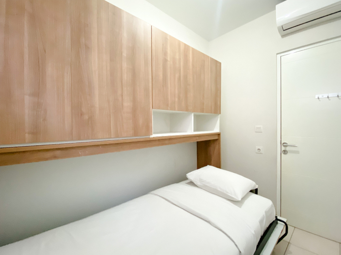 Bedroom 4, Homey and Nice 3BR at Springlake Summarecon Bekasi Apartment By Travelio, Bekasi