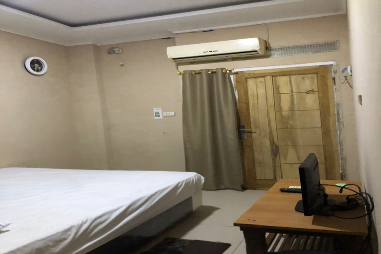 Bedroom 1, OYO 94086 Penginapan Kertajaya, North Lampung