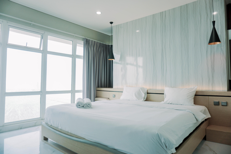 Bedroom 1, Stunning and Spacious 2BR Green Bay Condominium Apartment By Travelio, North Jakarta