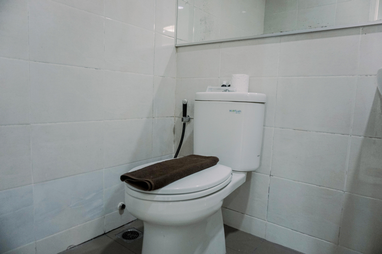 Bedroom 3, Stunning and Spacious 2BR Green Bay Condominium Apartment By Travelio, North Jakarta