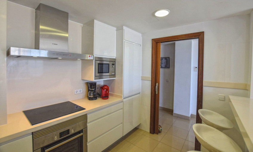 Private kitchen 4, Modern Apartment in Can Picafort Nice View of the Harbor, Near the Beach, Baleares