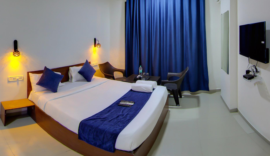 Bedroom 5, hotel rain sky inn, Pune