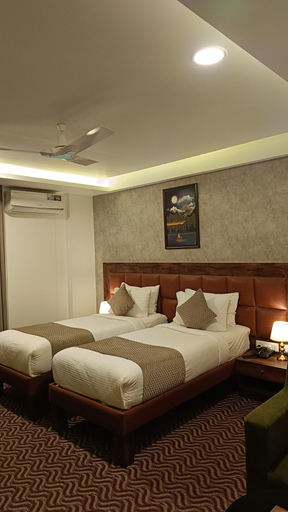 Bedroom 1, Royal Ace Luxur Hotel, Bangalore