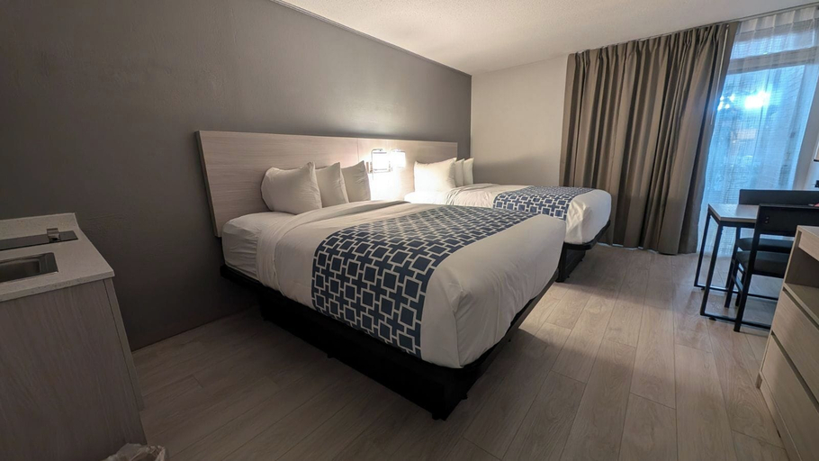 Bedroom 4, Clarion Inn and Suites Convention Center Kearney, Buffalo