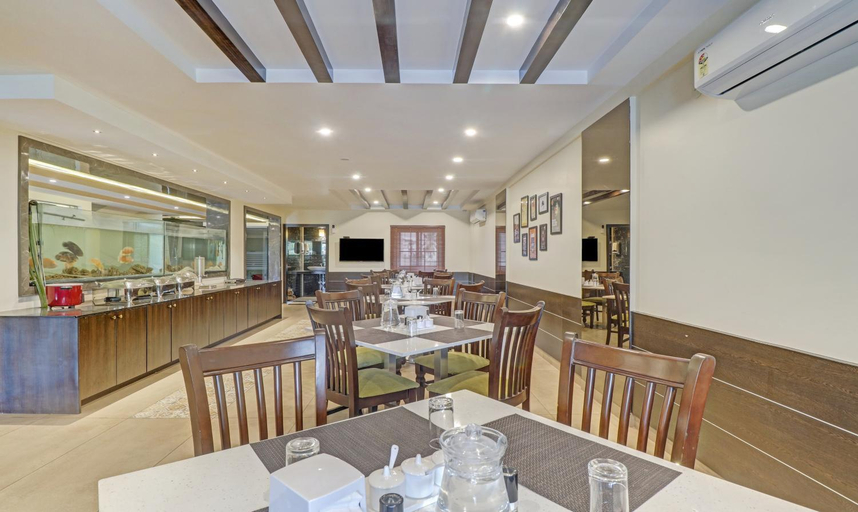 Food & Drinks 5, Treebo Premium Raj Vista Global Village, Bangalore