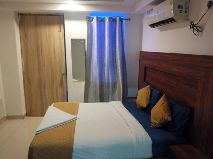 Bedroom 5, Goroomgo Hotel Diamond Mahipalpur, Delhi