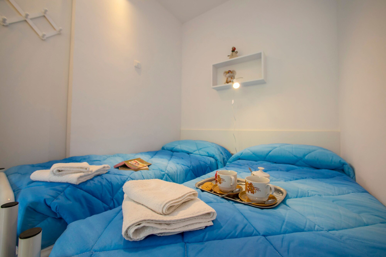 Bedroom 4, Riva Lago e Spiaggia Apartment, Trento