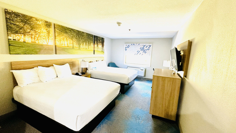 Bedroom 4, Days Inn & Suites by Wyndham Wynne, Cross