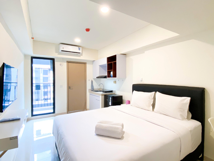Bedroom 1, Homey and Simply Look Studio Meikarta Apartment By Travelio, Cikarang