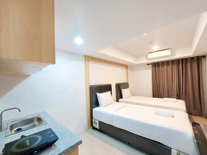 Bedroom 2, Homey and Comfortable Studio at De Prima Apartment By Travelio, Medan