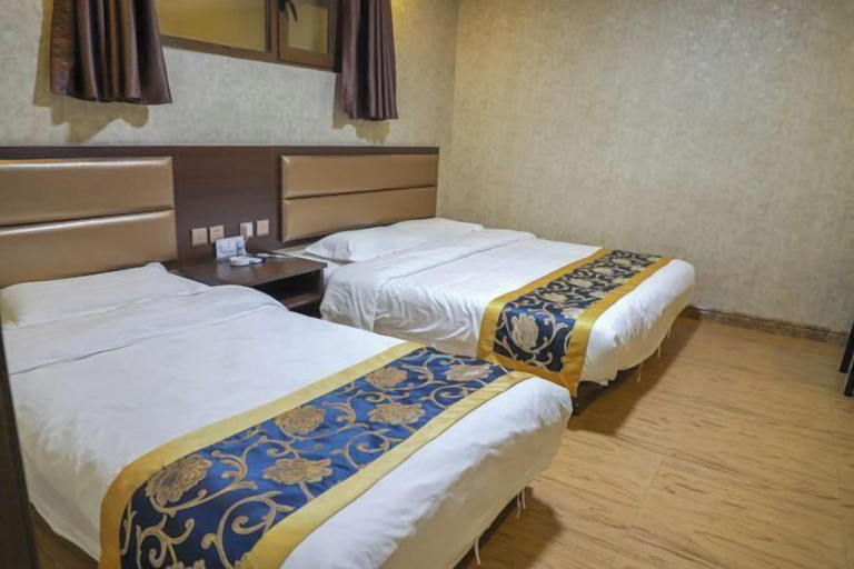 Bedroom 3, Yida Hotel (Changbai Mountain West Slope Tourist Transfer Center), Baishan