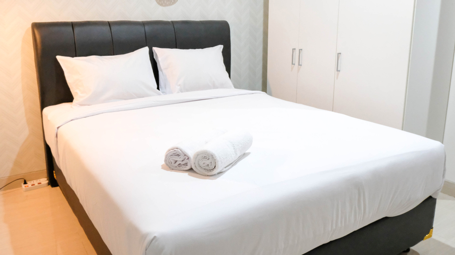 Bedroom 1, Elegant and Best Choice Studio at Grand Sungkono Lagoon Apartment By Travelio, Surabaya