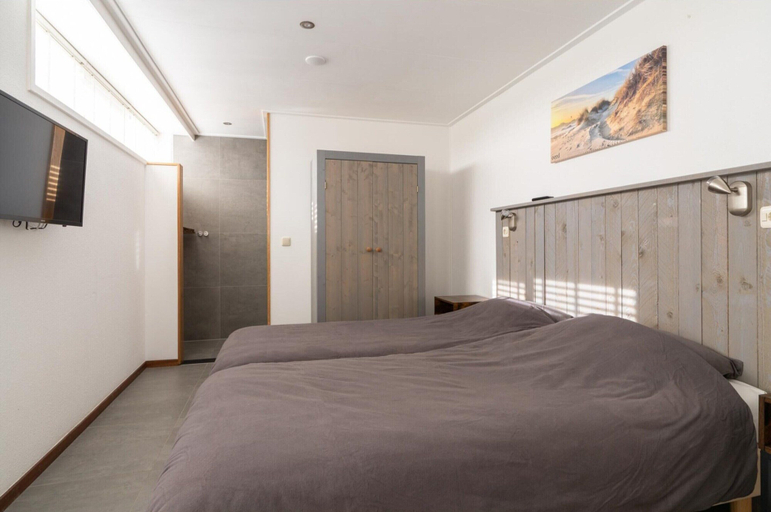 Bedroom 2, Holiday Home in Ameland by Golf Course, Ameland