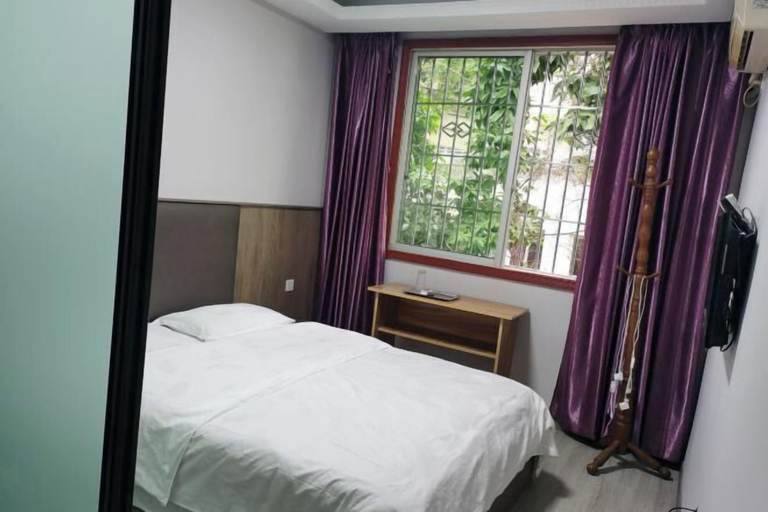 Bedroom 1, Zizhong Yonghao Business Hotel, Neijiang]]