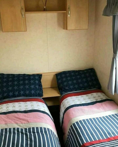 Bedroom 3, Captivating Three Bedroom Caravan tv in Each Room, Lincolnshire