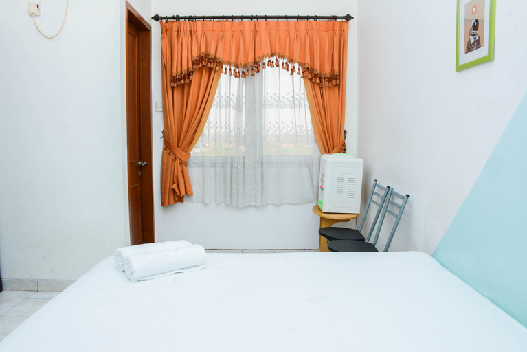 Bedroom 2, Homey Studio Apartment at Margonda Residence 1 By Travelio, Depok