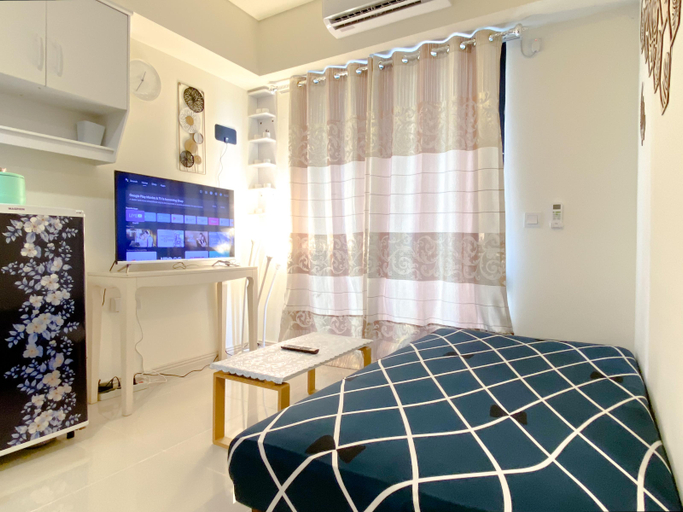 Bedroom 2, Homey and Good 2BR at Meikarta Apartment By Travelio, Cikarang