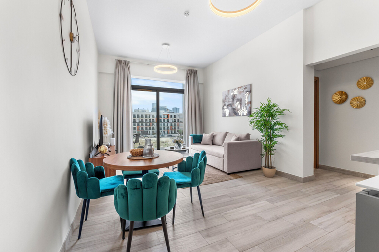 Dining room 5, Waves - Stylish 1BR in JVC with Balcony & Pool, Dubai