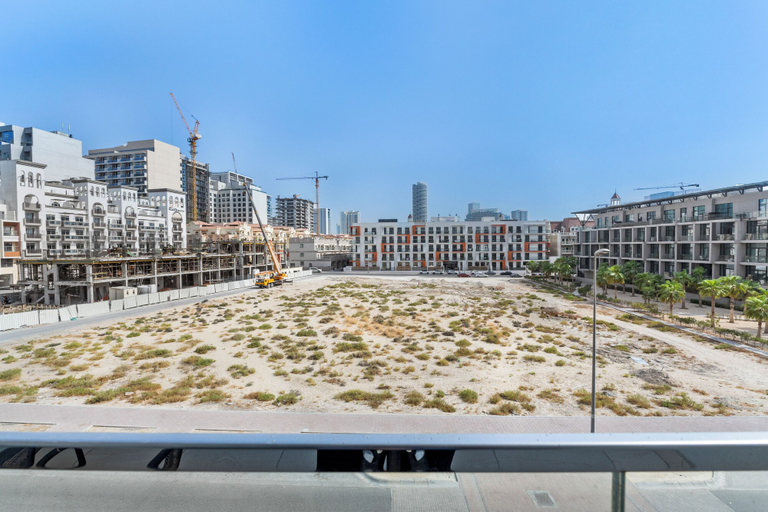 Balcony view, Waves - Stylish 1BR in JVC with Balcony & Pool, Dubai