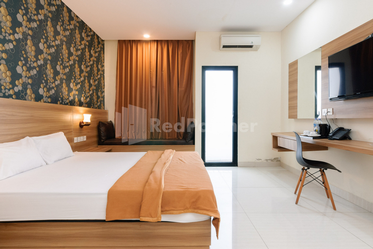 Deluma Hotel Syariah RedPartner - Tap to explore photos
