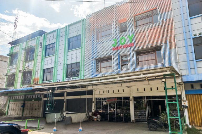 Exterior & Views 2, JOY GuestHouse Pekanbaru Mitra RedDoorz, Pekanbaru