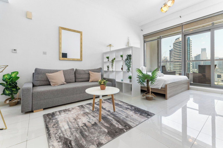 Living area 3, Waves - Executive Bay Studio: Canal View/Modern Amenities, Dubai