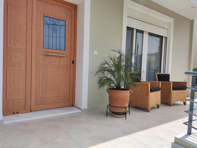 2, The Bright House a two-storey maisonette in Loutraki, Peloponnese