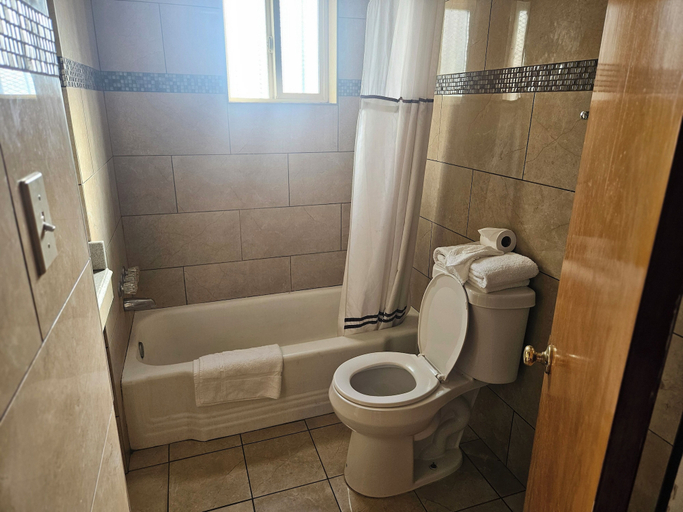 Bathroom 4, Branding Iron Motel, Clark