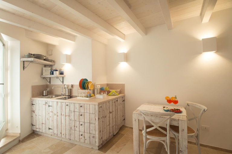 Others 4, Casa Martina, Bari