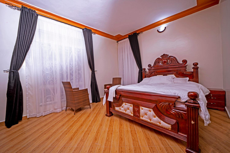 Bedroom, Kibibi Lake view furnished suites, Busiiro