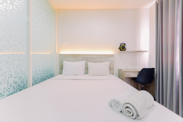 Bedroom 1, Well Furnished and Cozy 1BR Apartment Atlanta Residences By Travelio, Depok
