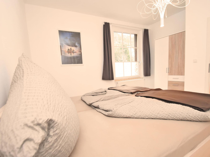 Bedroom 2, Spacious Apartment in Upper Harz near River, Goslar