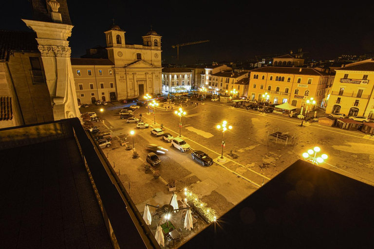 Others 5, Piazza del Mercato, L'Aquila