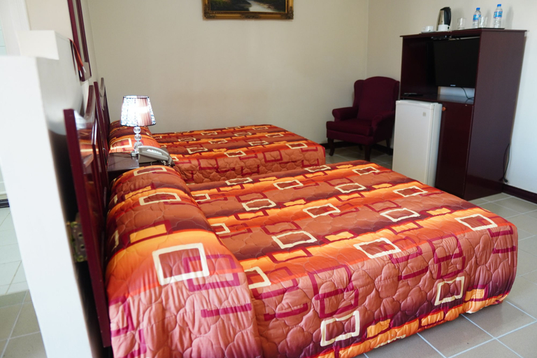 Bedroom 5, Regency Suites Hotel, City of Georgetown