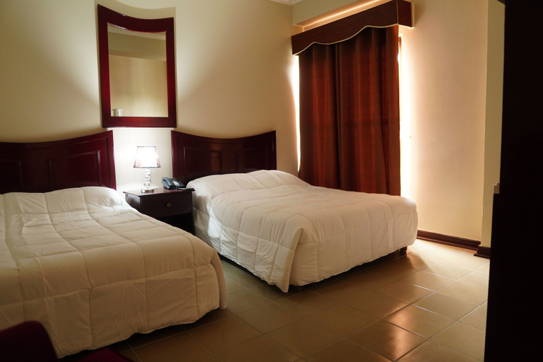 Bedroom 4, Regency Suites Hotel, City of Georgetown
