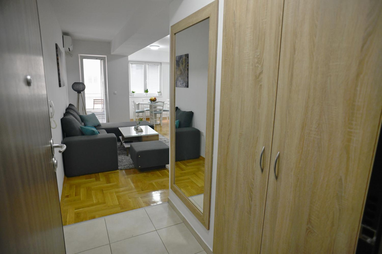 Bedroom 2, Chic Urban Retreat with Balcony, Parking & Wi-Fi, Skopje