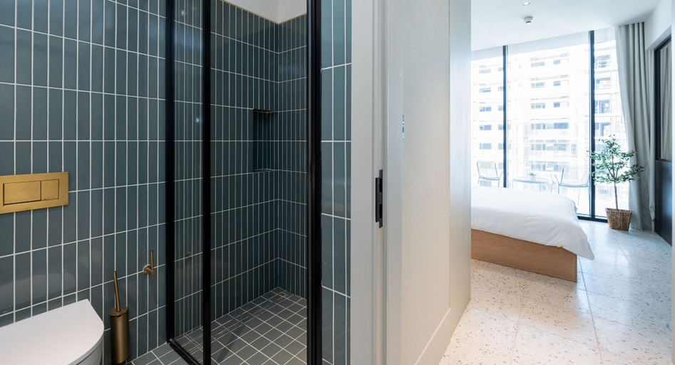 Bathroom 3, Urban 1BR w Balcony in Business Bay, Dubai