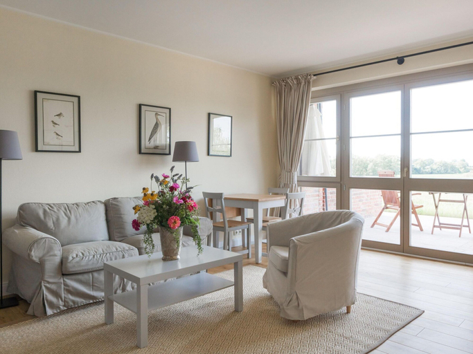 Living area 3, Ferienwohnung mit Kamin im Gut Ulrichshusen, Mecklenburgische Seenplatte