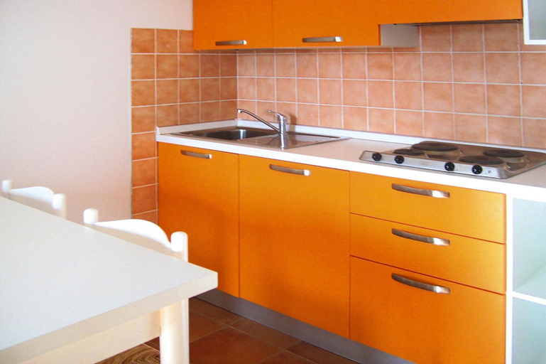 Private kitchen 3, Apartment in Pinarellu Near Beach & Pool, Corse-du-Sud