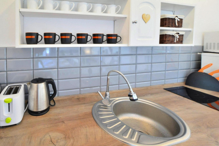 Private kitchen 5, Comfortable Holiday Homes With a Large Garden, Sławno