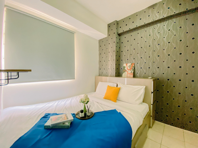 Comfortable and Homey 2BR Green Pramuka City Apartment By Travelio, Central Jakarta