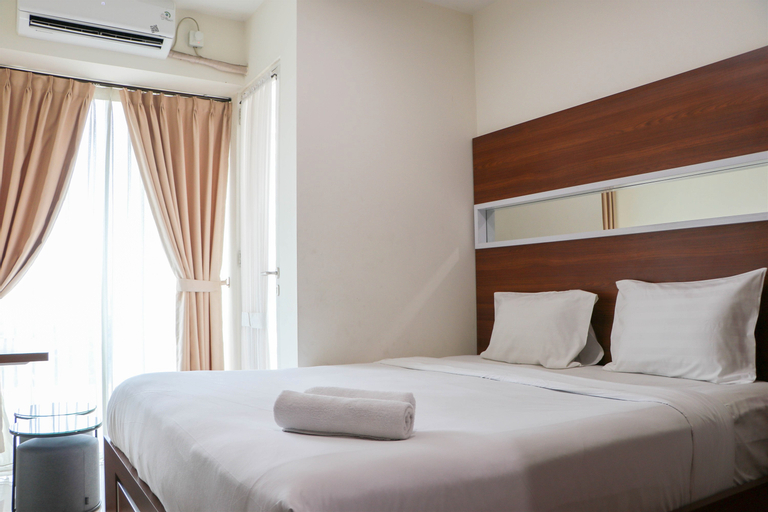 Restful 1BR without Living Room Grand Kamala Lagoon Apartment By Travelio, Kota Bekasi