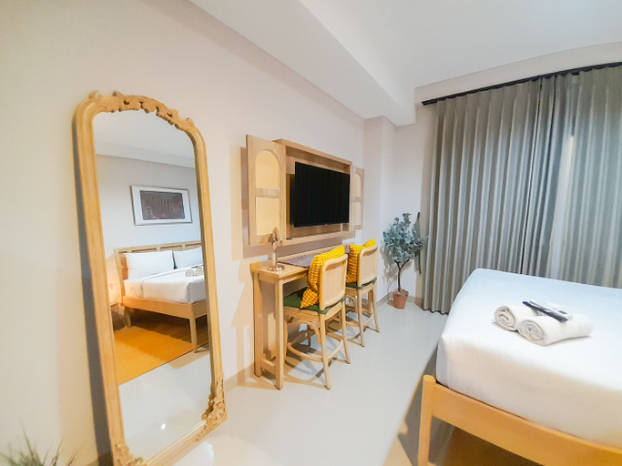 Bedroom 4, Comfortable Studio at Patraland Amarta Apartment By Travelio, Sleman