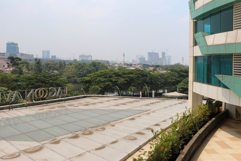 Restful 1BR without Living Room Grand Kamala Lagoon Apartment By Travelio, Kota Bekasi