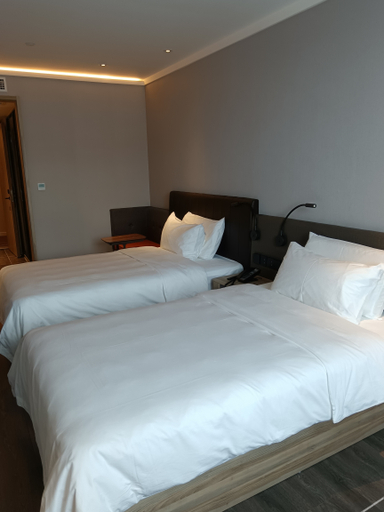 Bedroom 2, Hanting Hotel Dezhou Pingyuan Gongqingtuan Road, Dezhou