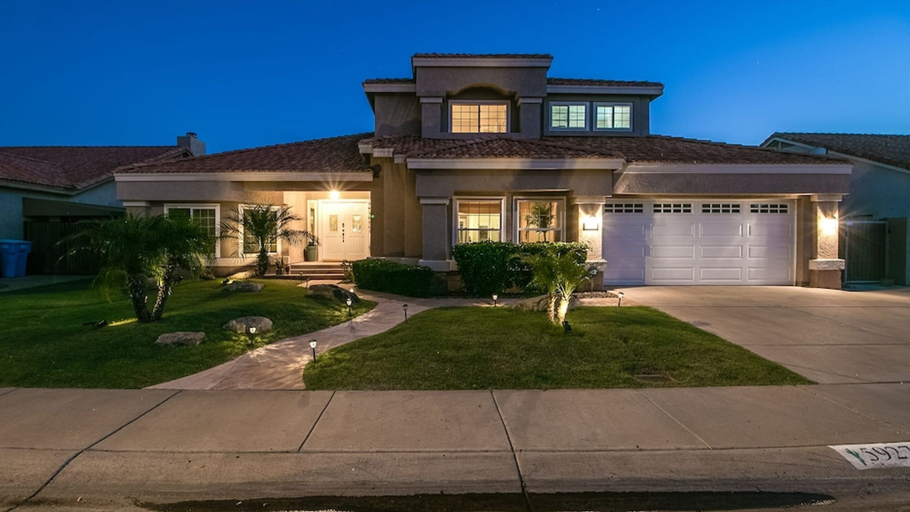 Front of property - evening/night, Luxe Scottsdale Home W/pool, Spa, & Tesla Charger, Maricopa