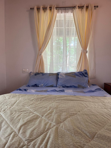 Bedroom 2, Gagadharam Tiny House, Kannur