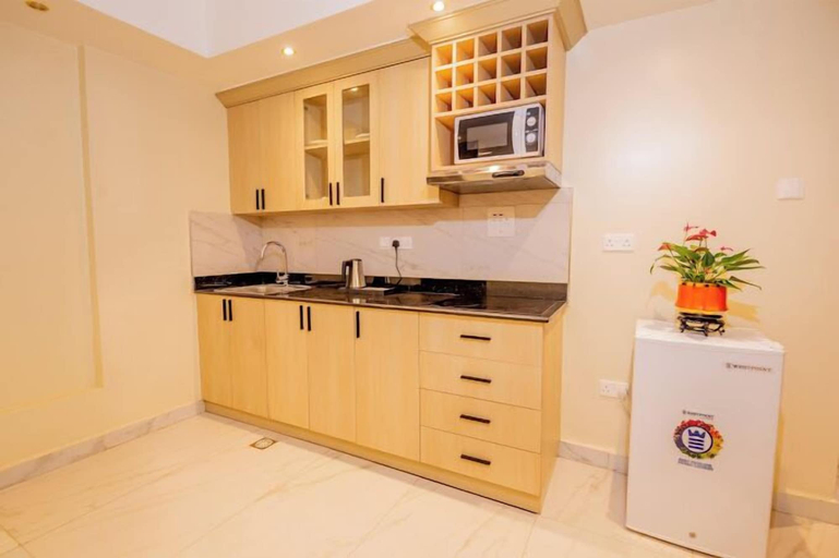 Others 5, The Grandville Manor, Kampala