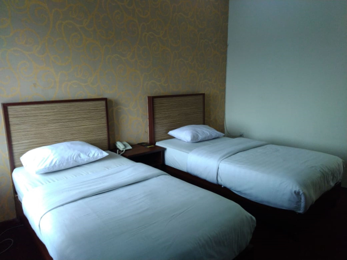 Bedroom 3, Hotel Grand Nusantara By Zuzu, Medan